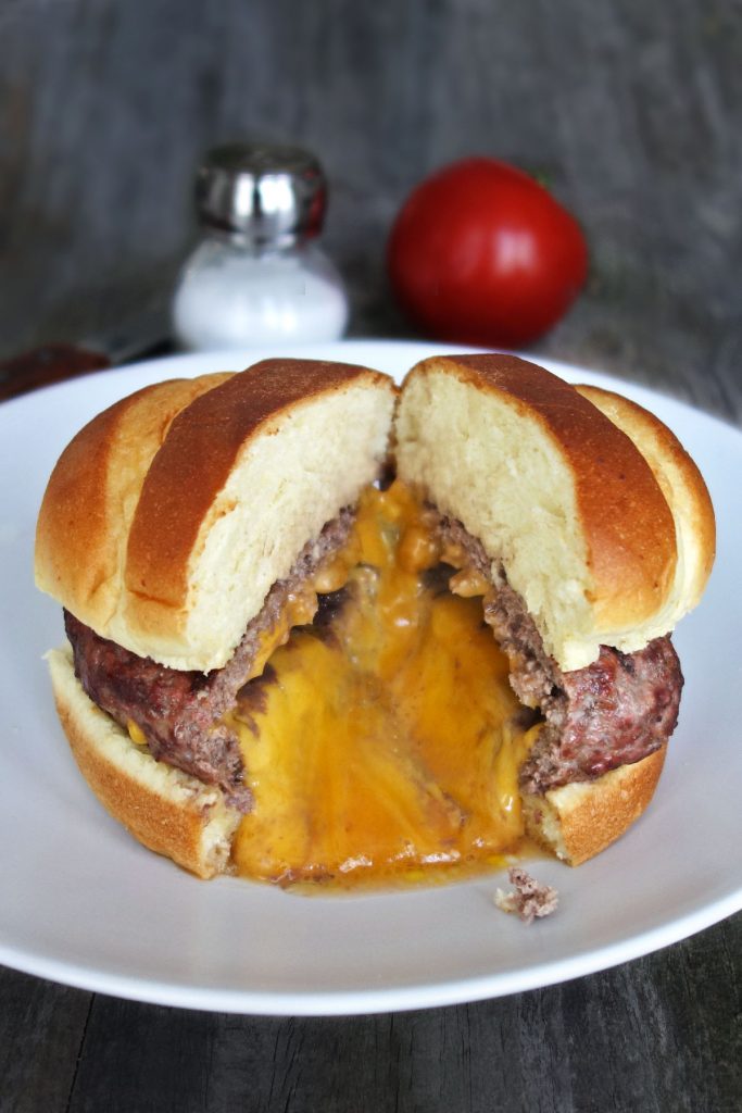 The Juicy Lucy is a classic MN burger recipe stuffed with cheese. These are quick & easy to make but require a few simple tricks to get it right.