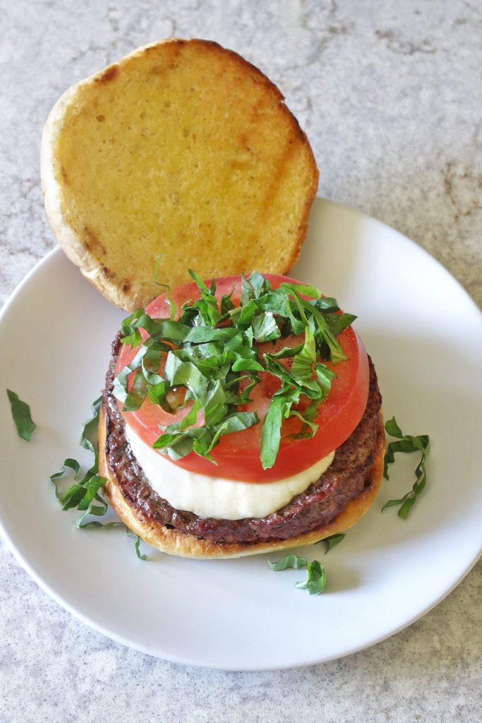caprese burger overhead view